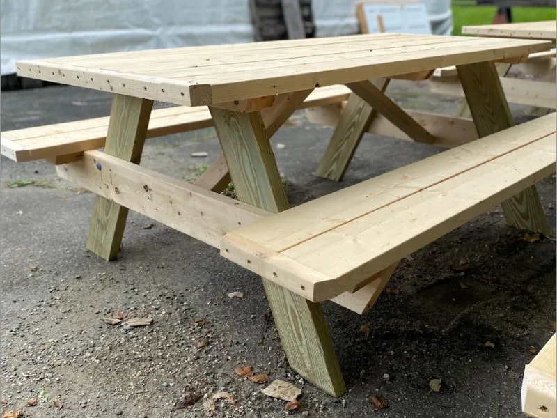 A wooden picnic table.