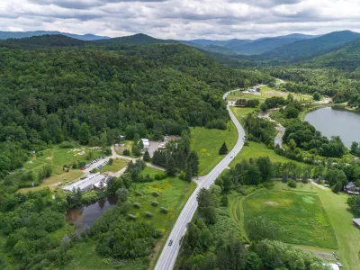 Aerial shot of the yestermorrow campus, Route 100, and the valley.