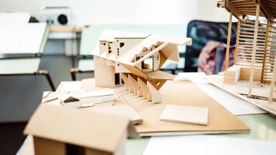 Tiny home models arrayed on a table