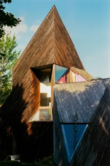 The Sibley House is photographed close up against blue sky.