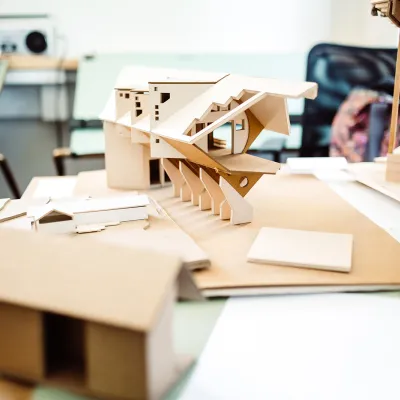 Tiny home models arrayed on a table
