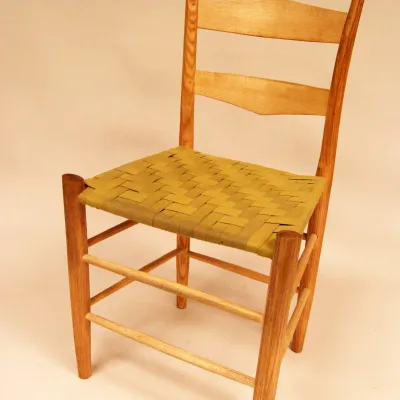 green ladder-back chair