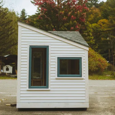 Shot of a small studio building with shed angled roof. 