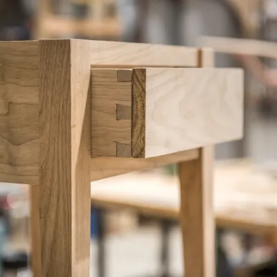 Detail shot of a shaker table drawer pulled out.