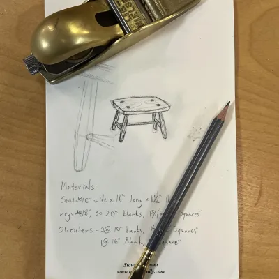 A pencil drawn sketch of a stool with a hand plane and a pencil placed artfully on the paper. 
