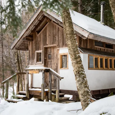 Photo of the timberframe cabin in winter