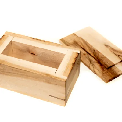 Wooden box with nesting lid
