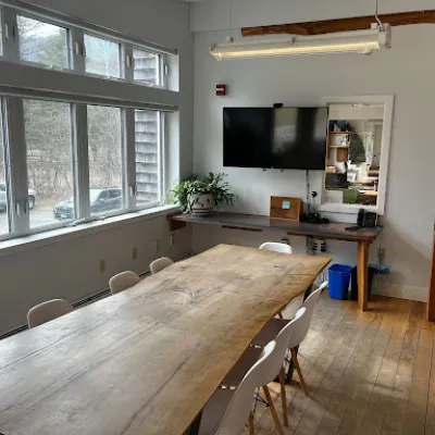 The conference room sits up to 8 people comfortably.