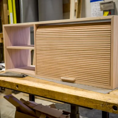 A cabinet with tambour door pictured in the woodshop
