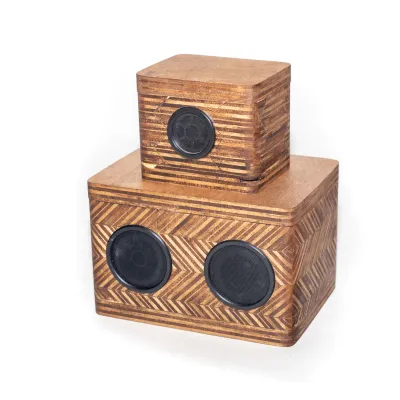 Wooden speaker boxes photographed with white background